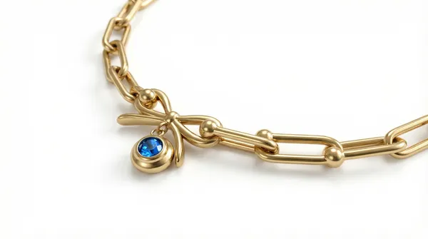 Gold_Bow_Charm_Bracelet_With_Evil_Eye