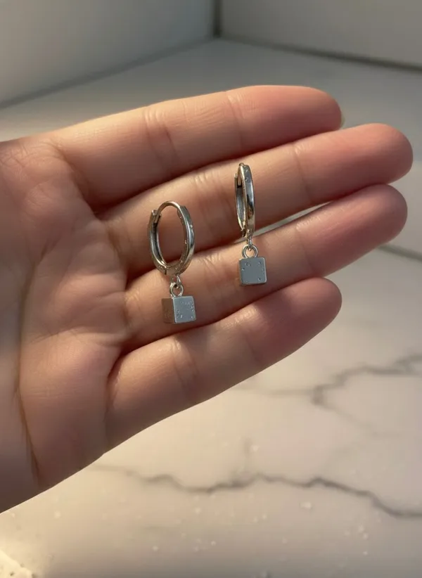 Silver_Hoop_Earrings_With_Black_Cube_Charm