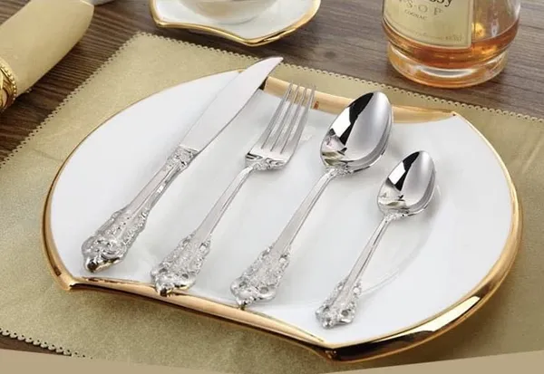 Kitchzengo™_4_PCS_Luxury_Silver_Cutlery_Set_–_Stainless_Steel_Spoon,_Fork,_Knife_&_Teaspoon_|_Royal_Engraved_Dinner_Set_with_Mirror_Finish