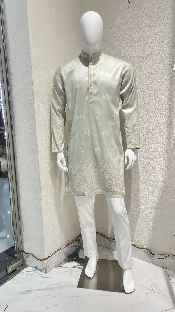 Pastel_Mint_Kurta_for_Men_featuring_Intricate_Threadwork_and_Geometric_Patterns