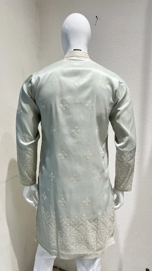 Pastel_Mint_Kurta_for_Men_featuring_Intricate_Threadwork_and_Geometric_Patterns