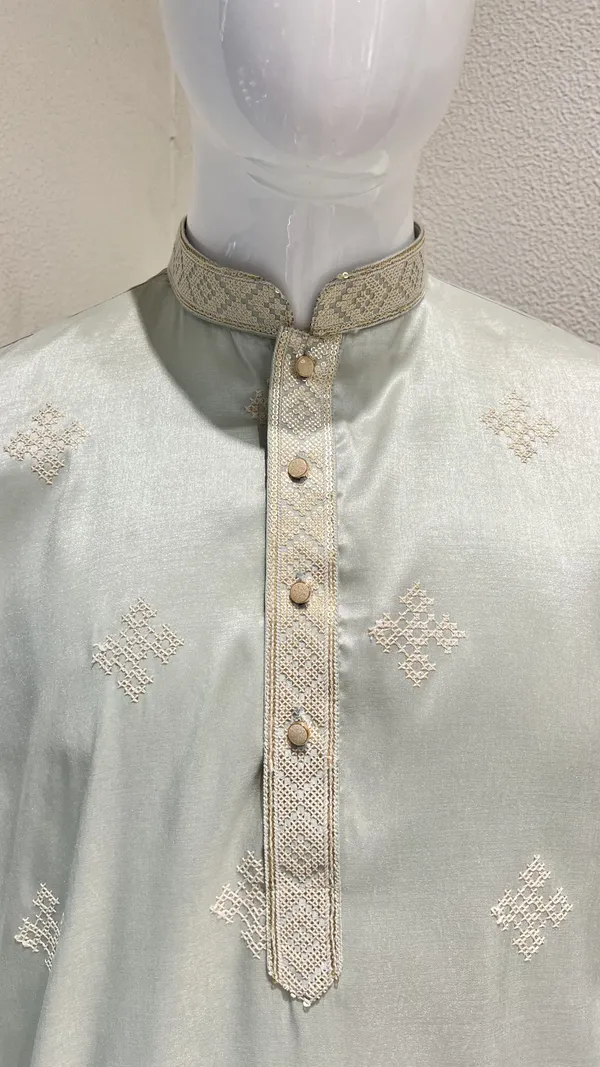 Pastel_Mint_Kurta_for_Men_featuring_Intricate_Threadwork_and_Geometric_Patterns