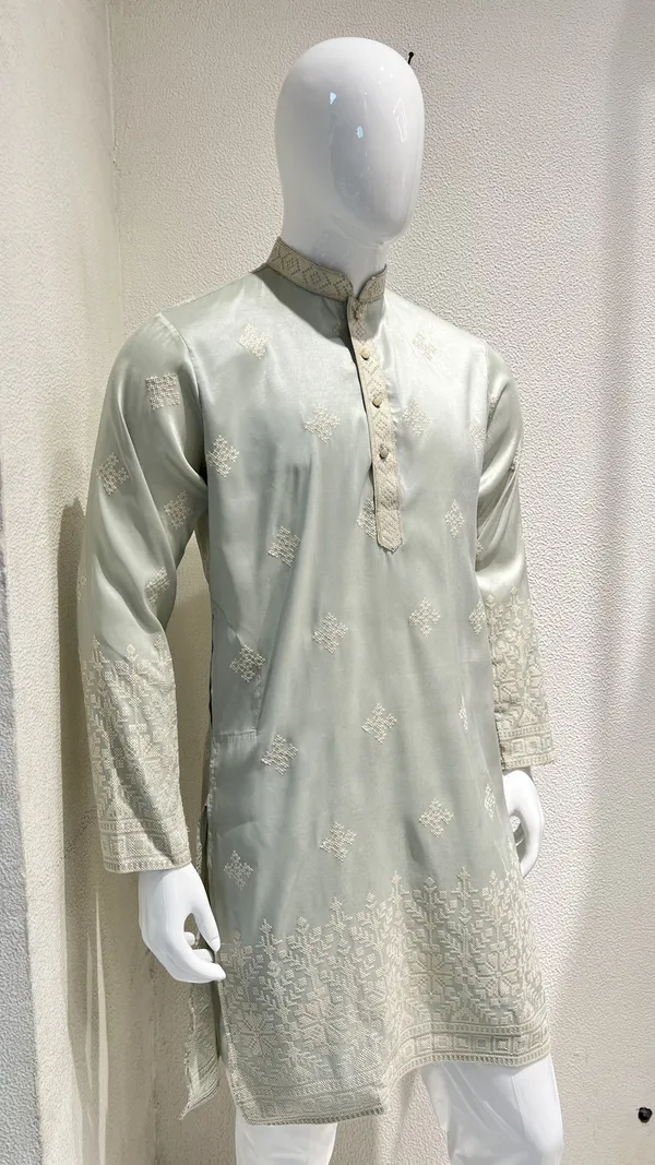 Pastel_Mint_Kurta_for_Men_featuring_Intricate_Threadwork_and_Geometric_Patterns