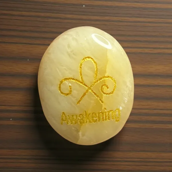 Zibu_Symbol_Palm_Stone_Awakening_Symbol_Engraved_On_Citrine
