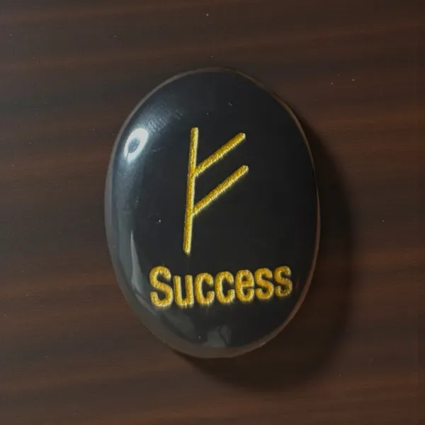 Zibu_Symbol_Palm_Stone_Success_Symbol_Engraved_On_Black_Tourmaline