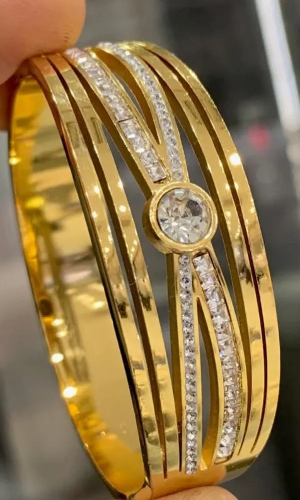 Gold-Plated_Multi-Band_Ring_With_Solitaire_Stone_And_Pave_Detailing
