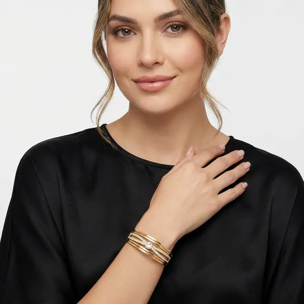 Gold-Plated_Multi-Band_Ring_With_Solitaire_Stone_And_Pave_Detailing