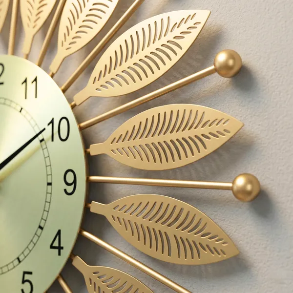 Luxury_Gold_Metal_Leaf_Wall_Clock_–_Elegant_Sunburst_Designer_Wall_Clock_for_Living_Room_&_Office_Décor