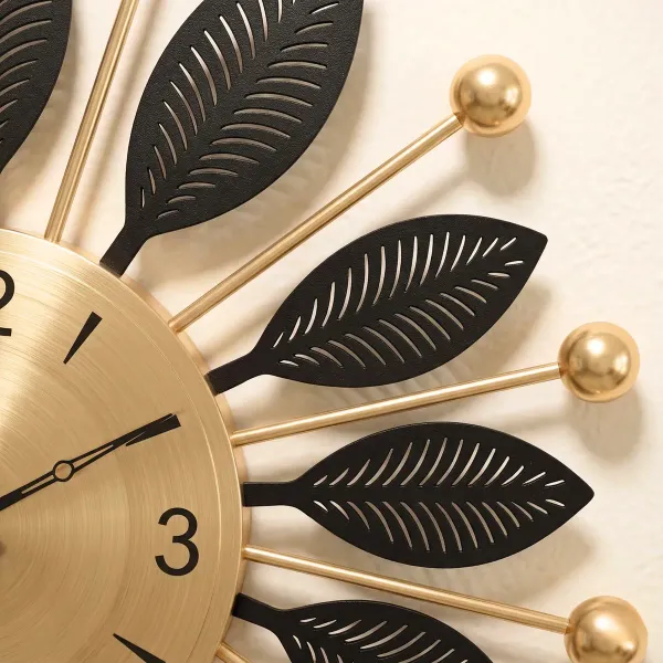 Luxury_Black_&_Gold_Metal_Leaf_Wall_Clock_–_Modern_Decorative_Silent_Wall_Clock_for_Living_Room_&_Bedroom