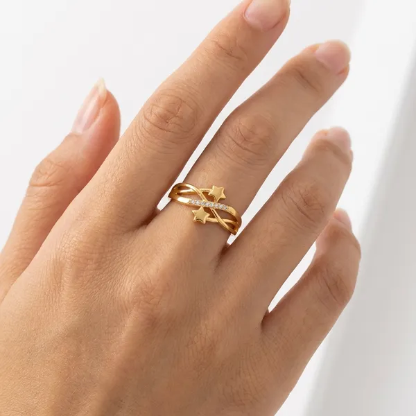 Gold_Toned_Twisted_Band_Ring_With_Diagonal_Diamond_Accent