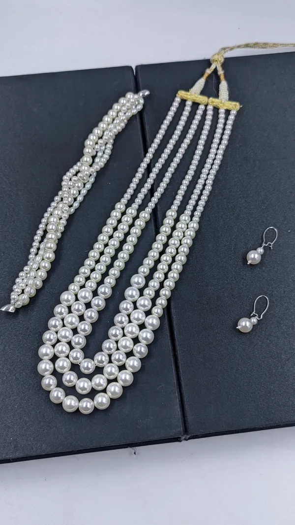 Hansini_Pearl__Premium_layered__Haar_with_Bracelet_For_Women