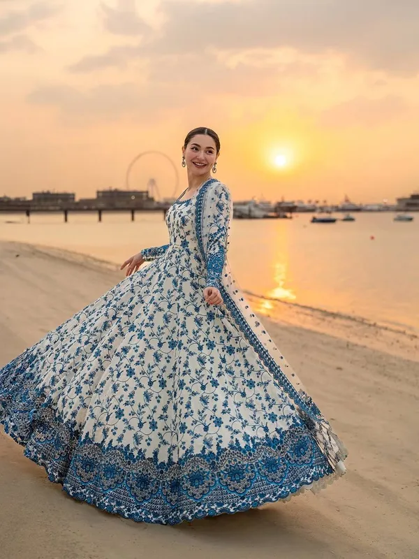 WHITE_FAUX_GEORGETTE_ANARKALI_SUIT_WITH_SEQUENCE_WORK