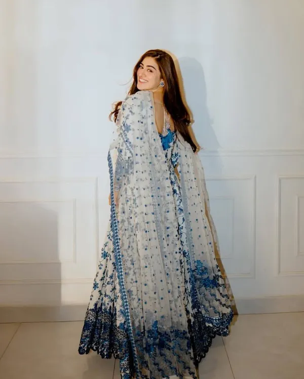 WHITE_FAUX_GEORGETTE_ANARKALI_SUIT_WITH_SEQUENCE_WORK