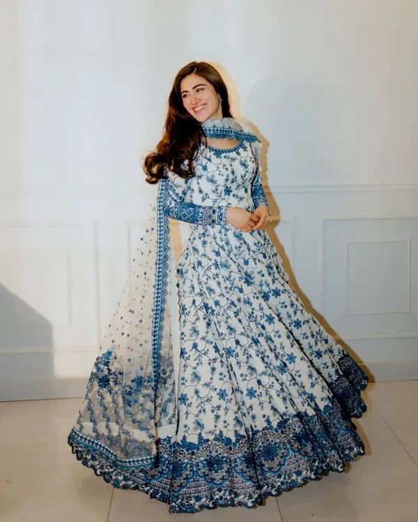 WHITE_FAUX_GEORGETTE_ANARKALI_SUIT_WITH_SEQUENCE_WORK