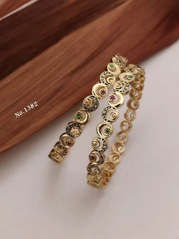 Gold_Metal_With_Gemstone_Embellishments_Bangles_For_Women