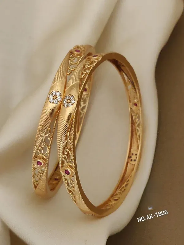 Gold_Metal_With_Stone_Embellishments_Bangles_For_Women