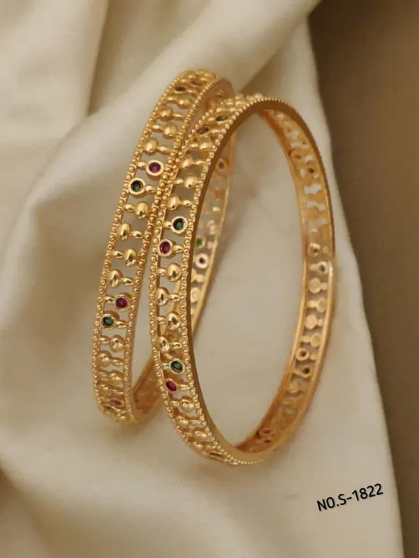 Gold_Metal_With_Stone_Embellishments_Bangles_For_Women