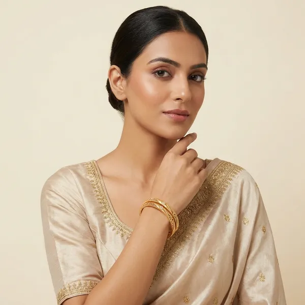Gold_Metal_With_Stone_Embellishments_Bangles_For_Women