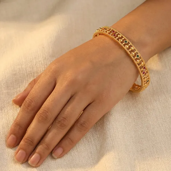 Gold_Metal_With_Stone_Embellishments_Bangles_For_Women