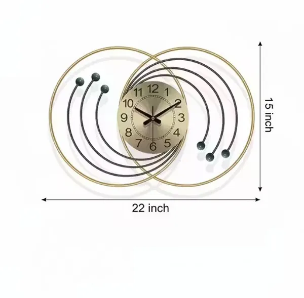 Gold_And_Brown_Modern_Decorative_Wall_Clock_With_D_Metal_Rings_And_Wooden_Ball_Accents