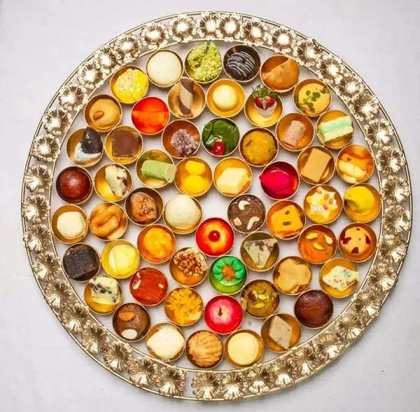 Assorted_Miniature_Desserts_And_Sweets_Collection_In_Decorative_Tray