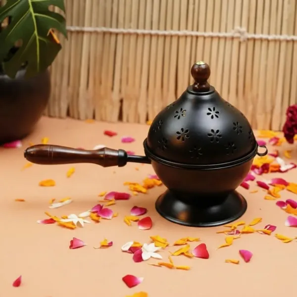 Black_Metal_Incense_Burner_With_Wooden_Handle_And_Decorative_Cutouts