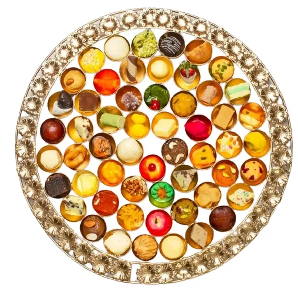Assorted_Miniature_Desserts_And_Sweets_Collection_In_Decorative_Tray
