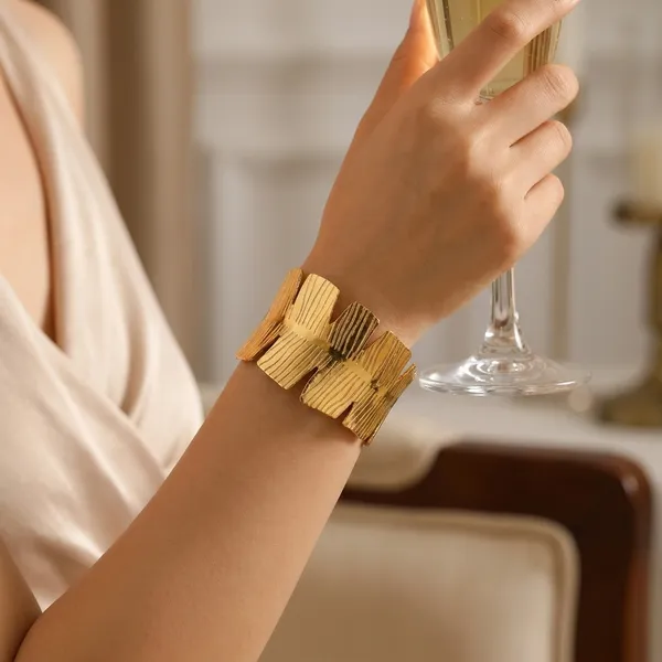 Luxurious_Gold_Toned_Wide_Cuff_Bracelet_For_Women
