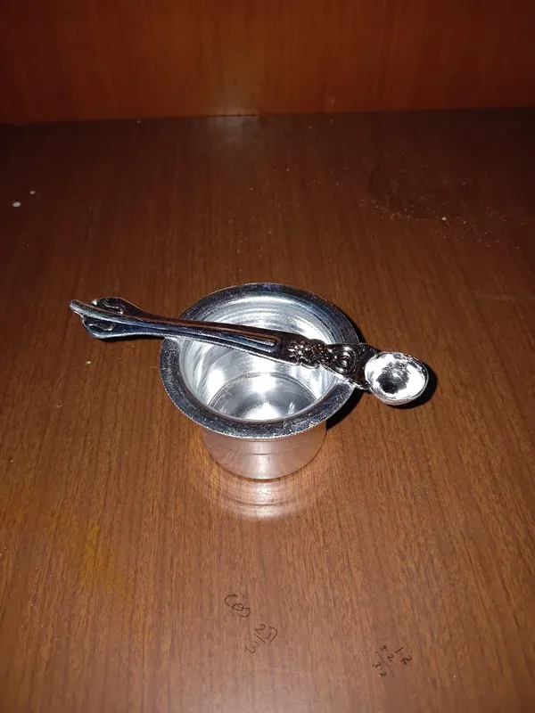 Decorative_Silver_Bowl_With_Ornate_Spoon_Set
