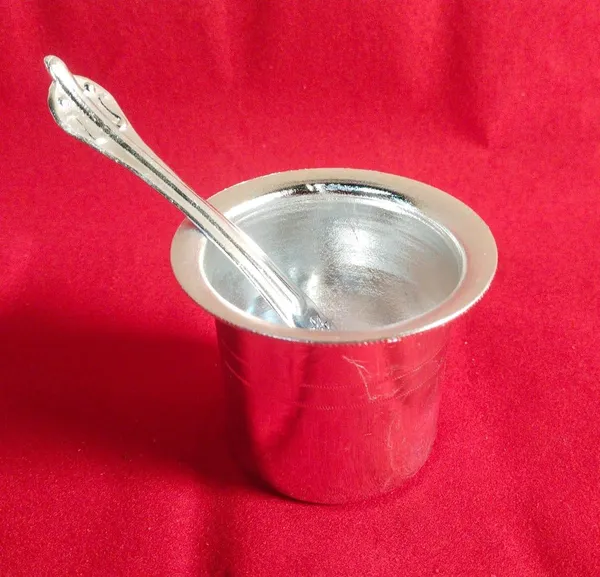 Decorative_Silver_Bowl_With_Ornate_Spoon_Set
