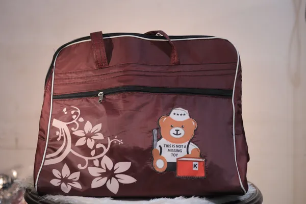 Brown_Floral_Print_Travel_Duffle_Bag_With_Bear_Design.Buy_1_Get_1_Free_Colour_May_Be_Varey