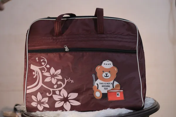 Brown_Floral_Print_Travel_Duffle_Bag_With_Bear_Design.Buy_1_Get_1_Free_Colour_May_Be_Varey