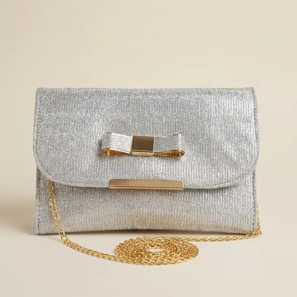 Elegant_Silver_Shimmer_Evening_Clutch_With_Bow_Detail._Buy_1_Get_1_Free_Colour_May_Be_Varey