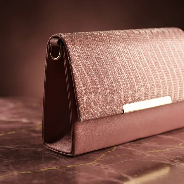 Elegant_Pink_Textured_Clutch_With_Woven_Flap_Design._Buy_1_Get_1_Free_Colour_May_Be_Varey
