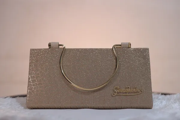 Sparkling_Glitter_Evening_Clutch_With_Metal_Handle._Buy_1_Get_1_Free_Colour_May_Be_Varey