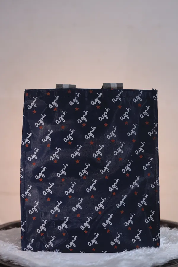 Agnes_B._Branded_All-Over_Print_Tote_Bag_Ã¢Â‚¬Â€Œ_Black_With_Heart_Logo_Pattern._Buy_1_Get_1_Free_Colour_May_Be_Varey