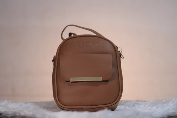 Brown_Compact_Crossbody_Lunch_Bag_With_Handle._Buy_1_Get_1_Free_Colour_May_Be_Varey