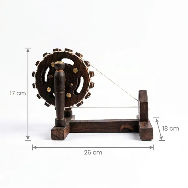 Handcrafted_Miniature_Wooden_Charkha_–_Traditional_Indian_Spinning_Wheel_Model