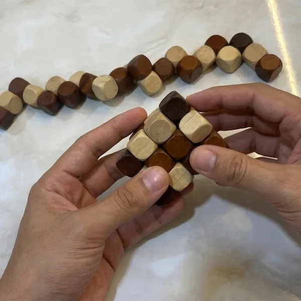 Light_And_Dark_Wood_Tones_Wooden_Brain_Teaser_Fidget_Snake_Cube_Puzzle_Toy