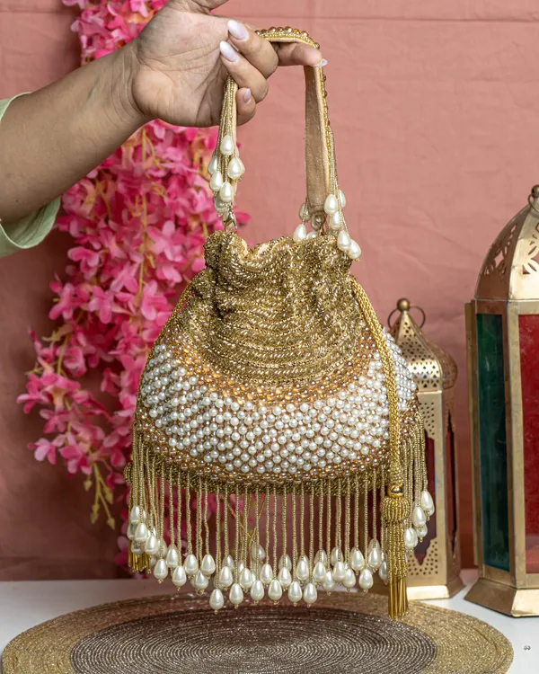 Seraphina_Gleam_Potli_–_Golden_Pearl_Drop_Embellished_Bag