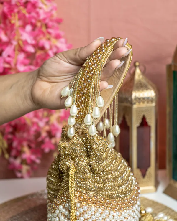 Seraphina_Gleam_Potli_–_Golden_Pearl_Drop_Embellished_Bag