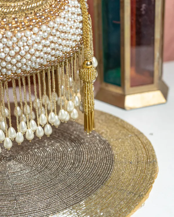 Seraphina_Gleam_Potli_–_Golden_Pearl_Drop_Embellished_Bag