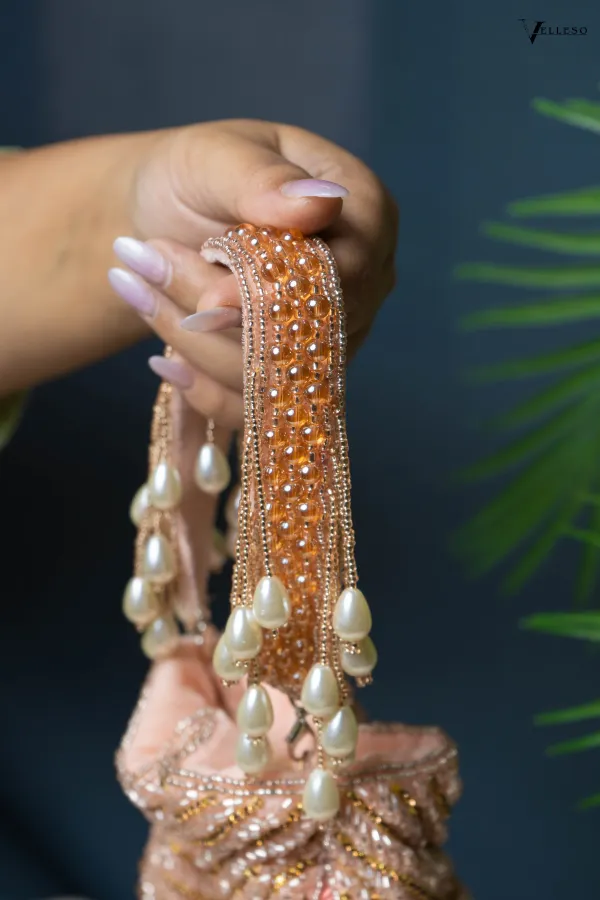 Seraphina_Gleam_Potli_–_Peach_Pearl_Drop_Embellished_Bag