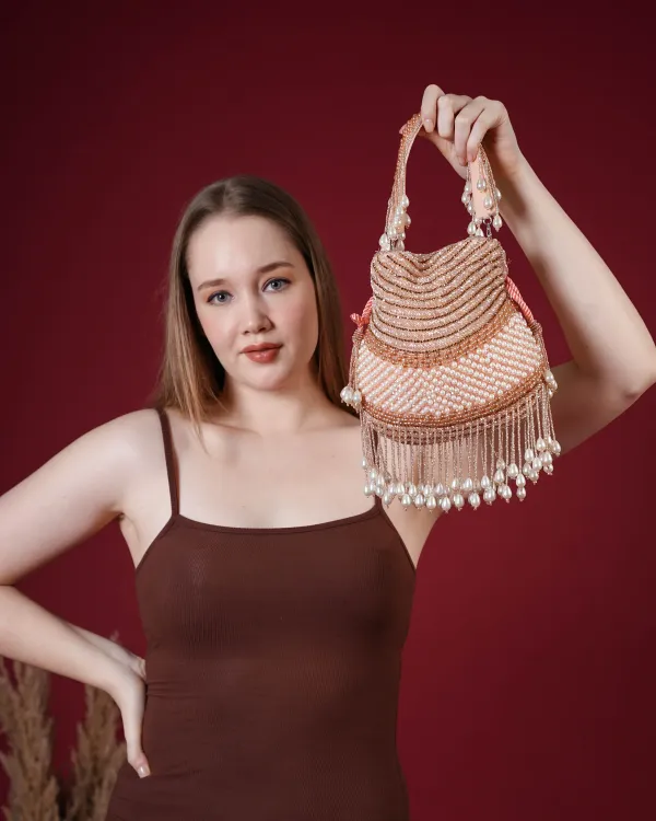 Seraphina_Gleam_Potli_–_Peach_Pearl_Drop_Embellished_Bag