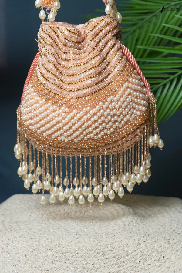 Seraphina_Gleam_Potli_–_Peach_Pearl_Drop_Embellished_Bag