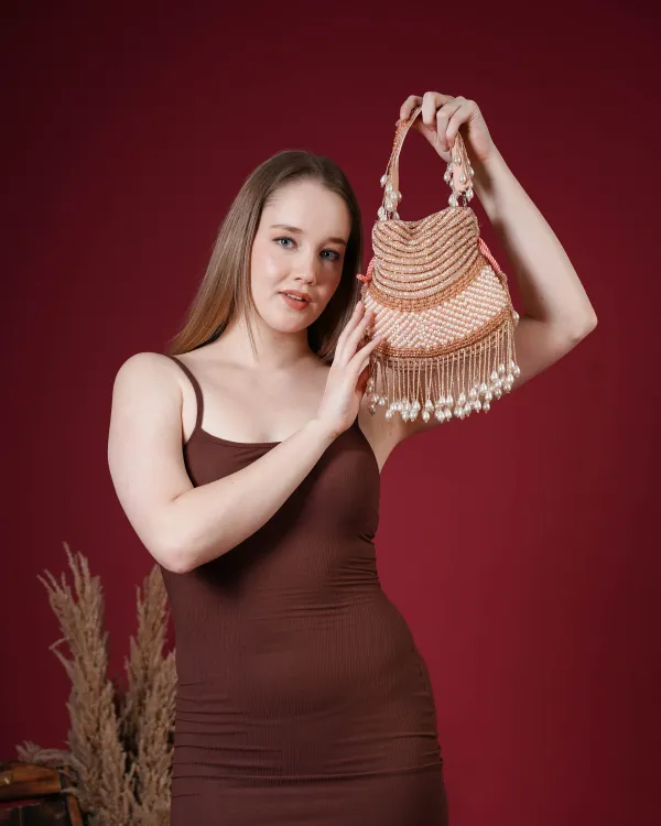 Seraphina_Gleam_Potli_–_Peach_Pearl_Drop_Embellished_Bag
