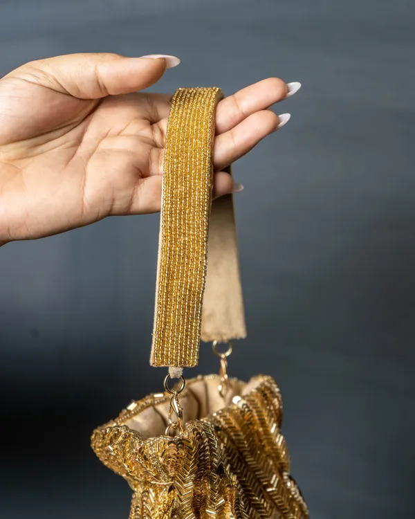 Sitara_Gold_Fringe_Potli_–_Hand-Beaded_Party_Bag_with_Crystal_Tassels