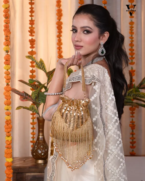 Sitara_Gold_Fringe_Potli_–_Hand-Beaded_Party_Bag_with_Crystal_Tassels