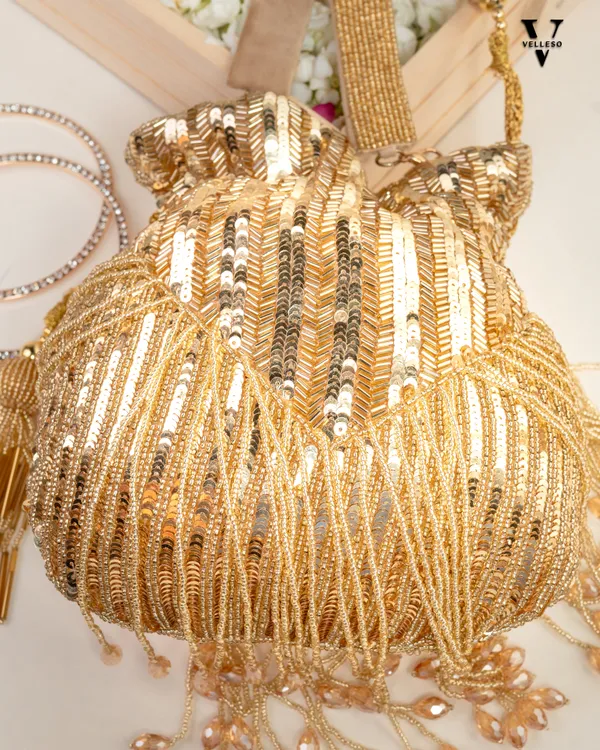 Sitara_Gold_Fringe_Potli_–_Hand-Beaded_Party_Bag_with_Crystal_Tassels