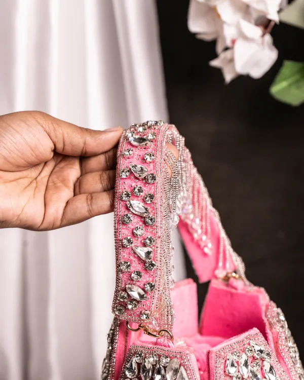 Noor_Pink_Crystal_Potli_–_Hand-Embellished_Velvet_Bag_with_Fringe_Handle